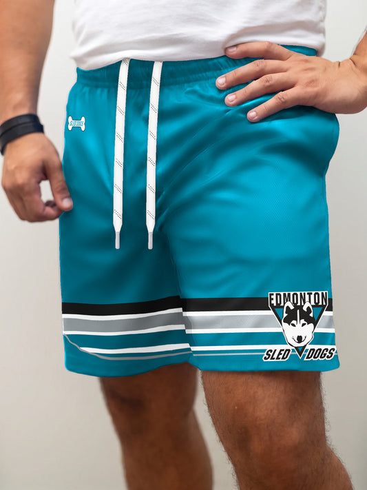 Model wearing the Bench Clearers Edmonton Sled Dogs Hockey Shorts - front view