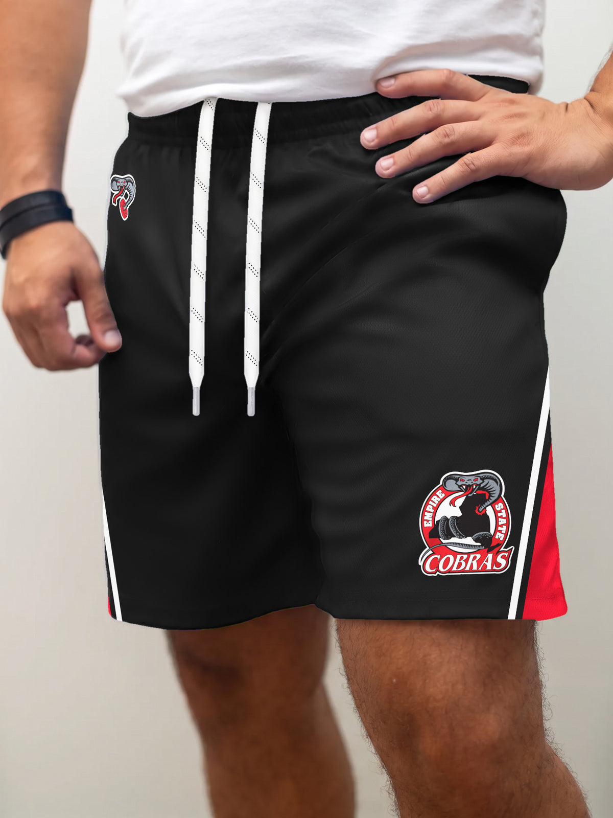 Model wearing the Bench Clearers Empire State Cobras Away Hockey Shorts - front view