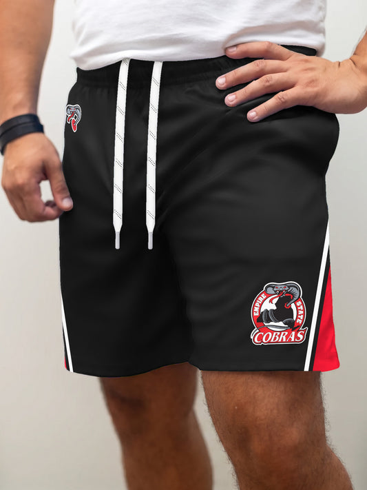 Model wearing the Bench Clearers Empire State Cobras Hockey Shorts - front view